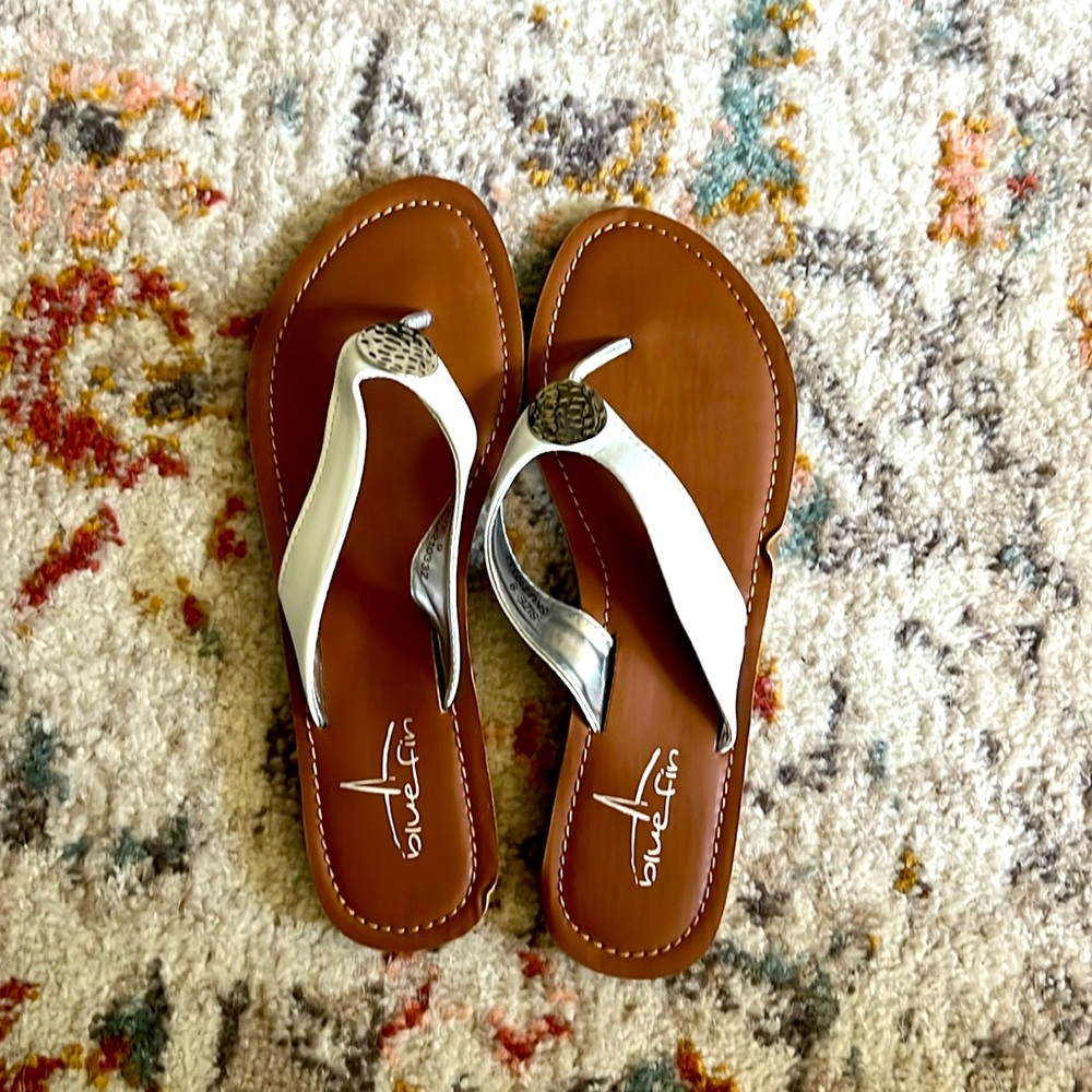 Size 9 Blue Fin flip flops; like new